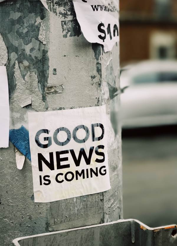 sign indicating good news is coming